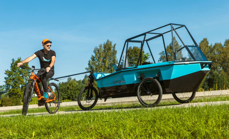 deze aanhanger voor je e-bike verandert in een camper en een boot